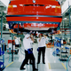 In this 1990s file photo, South Carolina workers complete a 3 Series sedan.